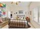 Cozy bedroom showcasing a comfortable bed, bright windows, and a calming atmosphere at 42370 W Hillman Dr, Maricopa, AZ 85138
