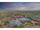 An aerial view of a full community, including the waterpark, pool, and community center at 42424 N Gavilan Peak Pkwy # 63212, Anthem, AZ 85086
