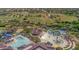 An aerial view of the waterpark and baseball field offering resort style fun and activities at 42424 N Gavilan Peak Pkwy # 63212, Anthem, AZ 85086