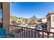 View from a balcony of the street and houses in the neighborhood with a clear blue sky at 42424 N Gavilan Peak Pkwy # 63212, Anthem, AZ 85086