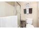 This bathroom features a glass shower, modern toilet, and a minimalist towel rack at 42424 N Gavilan Peak Pkwy # 63212, Anthem, AZ 85086