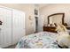 bedroom with a white closet door, a double bed and an animal-themed duvet at 42424 N Gavilan Peak Pkwy # 63212, Anthem, AZ 85086