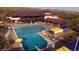 A large community pool with lap lanes, a diving board and chairs to relax at 42424 N Gavilan Peak Pkwy # 63212, Anthem, AZ 85086