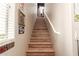 Staircase leading up to second floor with decorative mirrors and decor at 42424 N Gavilan Peak Pkwy # 63212, Anthem, AZ 85086