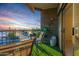 Cozy balcony with a chair and table perfect for enjoying sunrise and sunset views at 425 S Parkcrest Dr # 334, Mesa, AZ 85206