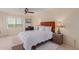 Bright bedroom featuring a large window, comfortable bed, and stylish decor, creating a cozy and inviting atmosphere at 425 S Parkcrest Dr # 334, Mesa, AZ 85206
