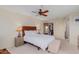 Inviting bedroom with a comfortable bed, dresser, side tables with lamps, and spacious closet at 425 S Parkcrest Dr # 334, Mesa, AZ 85206