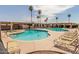 Sparkling community pool area with multiple pools, lounge chairs, and palm trees creating an inviting atmosphere at 425 S Parkcrest Dr # 334, Mesa, AZ 85206