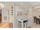 Breakfast bar with seating and easy access to the kitchen, dining area, and living room at 425 S Parkcrest Dr # 334, Mesa, AZ 85206