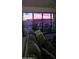 Cozy living room with comfortable sofa and an outside balcony sunset view at 425 S Parkcrest Dr # 334, Mesa, AZ 85206