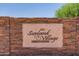 Sunland Village 55+ community sign built into a brick wall at 425 S Parkcrest Dr # 334, Mesa, AZ 85206