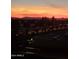Sunset view from the building over the city with distant mountains at 425 S Parkcrest Dr # 334, Mesa, AZ 85206