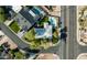 Aerial view of the property showcasing the home, landscaping, pool, and surrounding neighborhood at 4332 E Calle Redonda St, Phoenix, AZ 85018