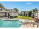 Backyard featuring a pool, grassy area, and privacy fence with a diving board at 4332 E Calle Redonda St, Phoenix, AZ 85018