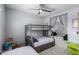 ' bedroom with bunk beds, ceiling fan and plenty of space at 45975 W Mountain View Rd, Maricopa, AZ 85139