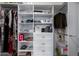Walk-in closet with clothing, shelves, hanging rods, drawers, and ample storage space at 45975 W Mountain View Rd, Maricopa, AZ 85139