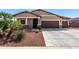 Beautiful single-Gathering home with a well-maintained front yard and a two-car garage at 45975 W Mountain View Rd, Maricopa, AZ 85139