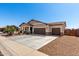Spacious home boasting a three-car garage and an expansive driveway at 45975 W Mountain View Rd, Maricopa, AZ 85139