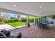 Large covered patio with outdoor seating and a view of the landscaped backyard at 4739 N 34Th Pl, Phoenix, AZ 85018