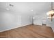 Bright bedroom featuring hardwood floors and a walk-in closet for storage, plus natural lighting at 4739 N 34Th Pl, Phoenix, AZ 85018