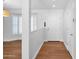 Bright entryway featuring wood floors, white walls, and a large bay window at 4739 N 34Th Pl, Phoenix, AZ 85018