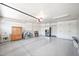 Well-maintained garage with ample storage space, sink, and epoxy flooring at 4739 N 34Th Pl, Phoenix, AZ 85018