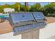 Close-up of stainless steel outdoor grill, perfect for outdoor cooking and entertaining at 4739 N 34Th Pl, Phoenix, AZ 85018
