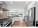 Well-equipped kitchen features stainless steel appliances, granite countertops, and ample cabinet space at 4739 N 34Th Pl, Phoenix, AZ 85018