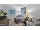 Cozy living room with plush seating, stylish decor, and abundant natural light at 4739 N 34Th Pl, Phoenix, AZ 85018