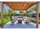 Charming outdoor living area featuring comfortable seating and a cozy pergola at 4739 N 34Th Pl, Phoenix, AZ 85018