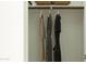 Organized closet with hanging clothes and ample storage space for wardrobe essentials at 4781 E Danta St, San Tan Valley, AZ 85143