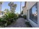 Inviting brick-paved patio surrounded by lush greenery and providing a private outdoor space at 4927 E Hazel Dr # 2, Phoenix, AZ 85044