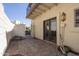 Private brick-paved patio with access to the house through double doors, perfect for outdoor entertaining at 4927 E Hazel Dr # 2, Phoenix, AZ 85044