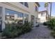 Charming brick-paved patio with manicured landscaping offering a relaxing outdoor living area at 4927 E Hazel Dr # 2, Phoenix, AZ 85044