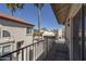 Exterior view from the balcony overlooking the neighborhood and the palm trees at 4927 E Hazel Dr # 2, Phoenix, AZ 85044