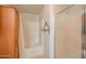 Bathroom shower and linen cabinet at 49853 W Jean Dr, Maricopa, AZ 85139