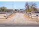 Gravel driveway flanked by a white fence at 49853 W Jean Dr, Maricopa, AZ 85139