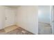 Entryway with a white front door, tile flooring, and access to other rooms at 49853 W Jean Dr, Maricopa, AZ 85139