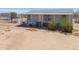Charming single-story home with a cozy covered porch and desert landscaping at 49853 W Jean Dr, Maricopa, AZ 85139
