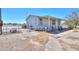 Charming single-story home with a covered porch and desert landscaping at 49853 W Jean Dr, Maricopa, AZ 85139