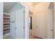 Hallway with access to the bathroom and bedrooms at 49853 W Jean Dr, Maricopa, AZ 85139