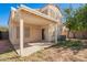 Backyard featuring a covered patio and mature trees at 5057 E Dragoon Ave, Mesa, AZ 85206