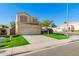 Lovely two-story home with a well-maintained front yard and attached two-car garage at 5057 E Dragoon Ave, Mesa, AZ 85206