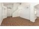 Bright living room showcasing wood-look floors, high ceilings, and natural light at 5057 E Dragoon Ave, Mesa, AZ 85206