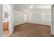 Spacious main bedroom featuring an en-suite bathroom and plush carpet at 5057 E Dragoon Ave, Mesa, AZ 85206