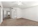 Bright and spacious main bedroom with neutral carpet, leading to the main bath and walk-in closet at 5057 E Dragoon Ave, Mesa, AZ 85206