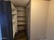 Walk-in pantry with shelving and a new floor at 52150 W Cardinal S Rd, Maricopa, AZ 85139
