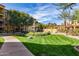 Beautifully landscaped community lawn with lush greenery and walking paths near the residences at 5450 E Deer Valley Dr # 2003, Phoenix, AZ 85054