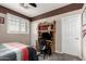 Cozy bedroom featuring brown accent, ceiling fan and plantation shutters creating a relaxing and peaceful space at 5622 W Cavedale Dr, Phoenix, AZ 85083
