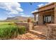 Charming outdoor patio overlooking the golf course and mountain range in the distance at 7600 E Golden Eagle Cir, Gold Canyon, AZ 85118